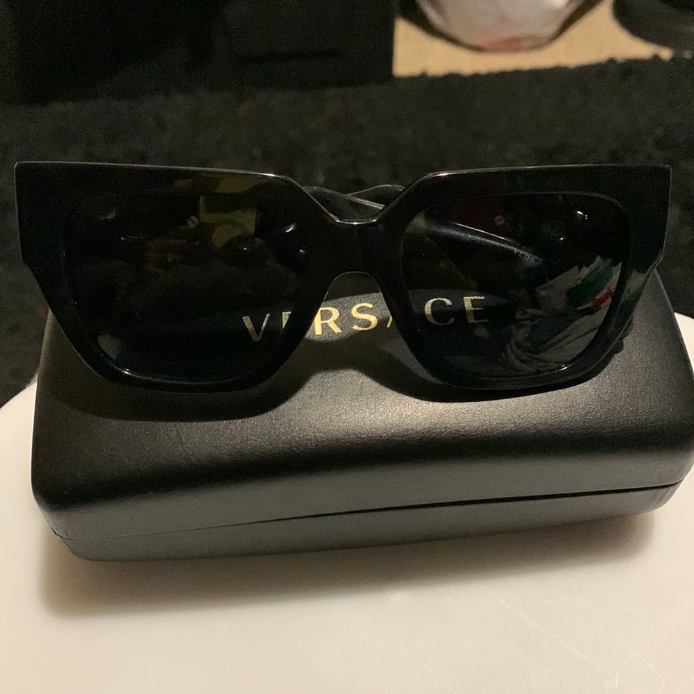 Versace women’s sunglasses black with gold hardware